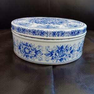 Vintage tin with sewing notions